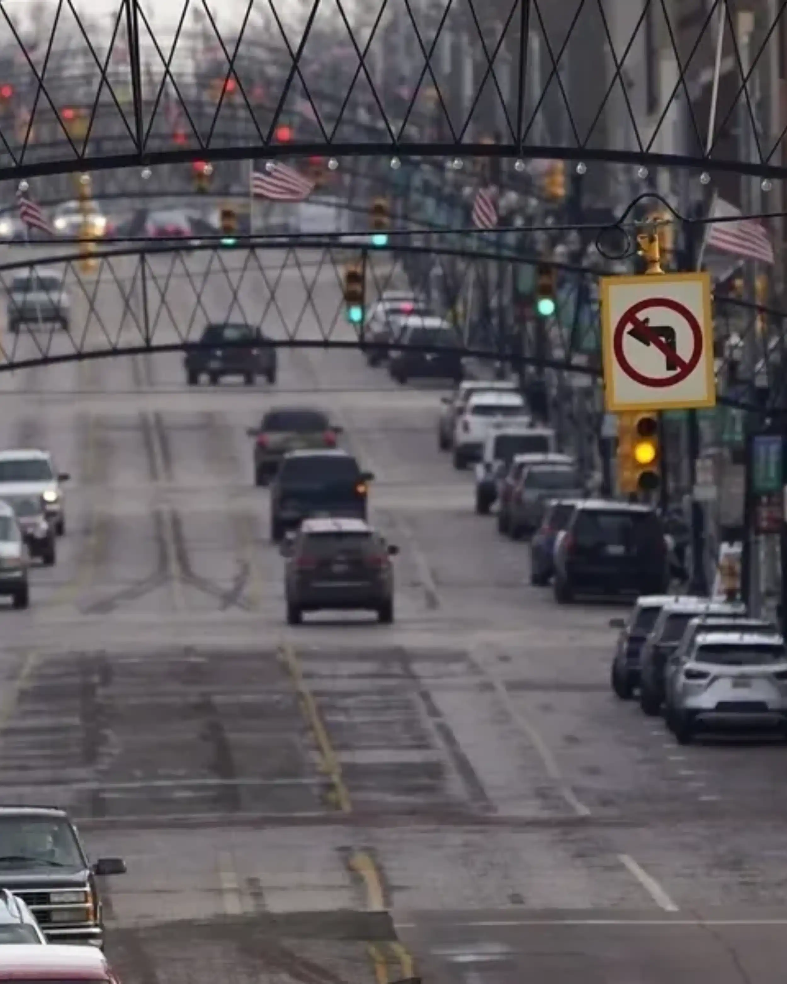 A busy street with cars driving on it.